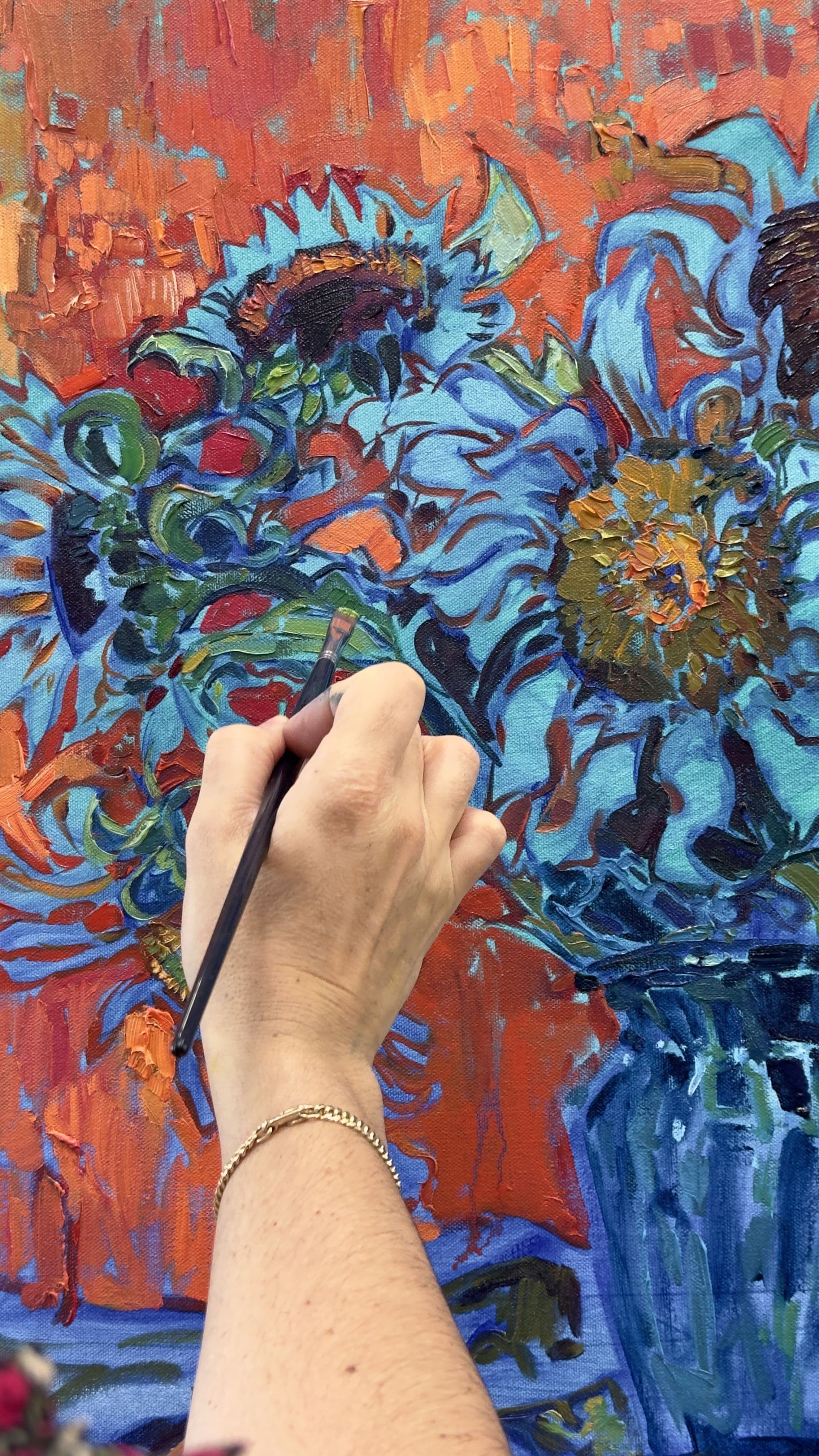 Alexandrea Roach painting in her studio